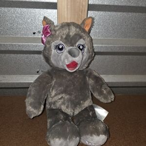 Gray Stuffed Animal Wolf with Pink Bow